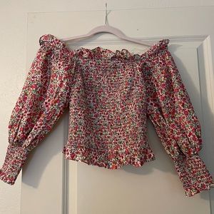 Floral off the shoulder ruched top. Size small. Never worn! Has tags.
